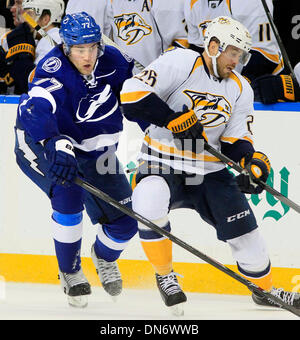 Tampa, Florida, USA. 19th Dec, 2013. DIRK SHADD | Times .Tampa Bay Lightning defenseman Victor Hedman (77) battles to get the puck from Nashville Predators left wing Viktor Stalberg (25) during second period action at the Times Forum in Tampa Thursday evening (12/19/13) Credit:  Dirk Shadd/Tampa Bay Times/ZUMAPRESS.com/Alamy Live News Stock Photo