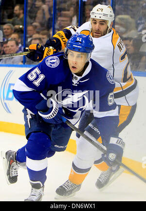 Tampa, Florida, USA. 19th Dec, 2013. DIRK SHADD | Times .Tampa Bay Lightning center Valtteri Filppula (51) fights to get to the puck along with Nashville Predators left wing Eric Nystrom (24) during second period action at the Times Forum in Tampa Thursday evening (12/19/13) Credit:  Dirk Shadd/Tampa Bay Times/ZUMAPRESS.com/Alamy Live News Stock Photo