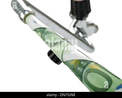 running tap dripping Euro banknote Stock Photo