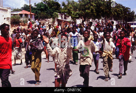 Nov. 30, 1993 - Mogadishu, Somalia - Hundreds of people march through the streets of Mogadishu protesting against the civil war. (Credit Image: © Theodore Liasi/ZUMAPRESS.com) Stock Photo