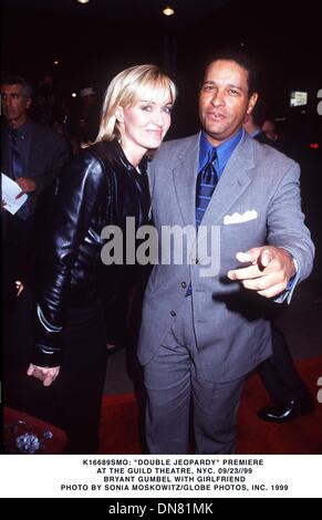 Sept. 23, 1999 - K16689SMO: ''DOUBLE JEOPARDY'' PREMIERE.AT THE GUILD THEATRE, NYC.  09/23/99.BRYANT GUMBEL WITH GIRLFRIEND. SONIA MOSKOWITZ/   1999(Credit Image: © Globe Photos/ZUMAPRESS.com) Stock Photo