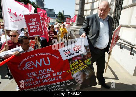 Postal workers and campaigners from the Communication Workers Union protest outside the Royal Mail headquarters Stock Photo