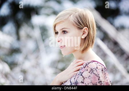 Portrait of a young woman in snow Stock Photo