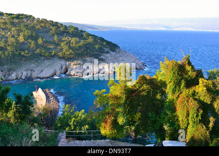 Looking down at the harbour wall of the port in Vrbnik , a small Croatian town on the east coast of the island of Krk. Stock Photo