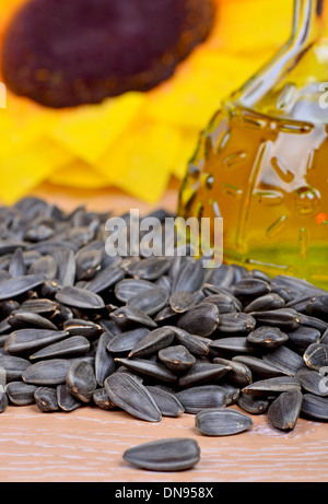 Fresh sunflower seeds oil in a bottle Stock Photo