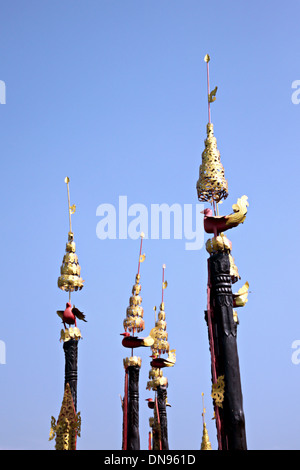 Artistic poles of Thailand style on blue sky. Stock Photo