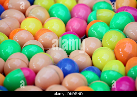 Colorful plastic spheres floating on the water. Stock Photo