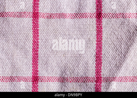 closeup of a white towel with red lines, background texture. Stock Photo