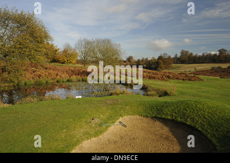 Knole Park Golf Club - View over small pond to 8th Green with Autumn Colours and Trees Stock Photo