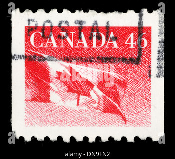 CANADA - CIRCA 1990: A stamp printed in Canada shows Canadian flag and ...