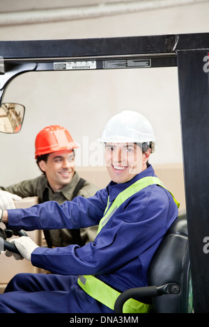 Casual portrait of two men in Warehouse Stock Photo