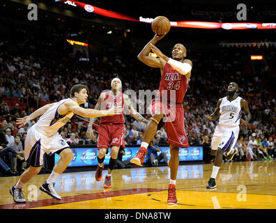 Miami, FL, USA. 20th Dec, 2013. Florida, USA - United States - fl-heat-kings20g -- Miami Heat guard Ray Allen drives to the basket past Sacramento Kings guard Jimmer Fredette during the first half, Friday, December 20, 2013, at AmericanAirlines Arena. Michael Laughlin, South Florida Sun Sentinel Credit:  Sun-Sentinel/ZUMAPRESS.com/Alamy Live News Stock Photo