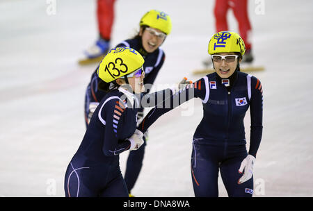 Trentino, Italy. 20th Dec, 2013. South Korea's Lee Eunbyul (L) and Lee Soyoun (R) celebrate after the women's short track 3,000m relay final at the 26th Winter Universiade in Trentino, Italy, Dec. 20, 2013. South Korea claimed the title with 4 minutes and 15.946 seconds. Credit:  Bai Xuefei/Xinhua/Alamy Live News Stock Photo