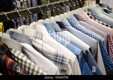 Clothes hangers in a line Stock Photo