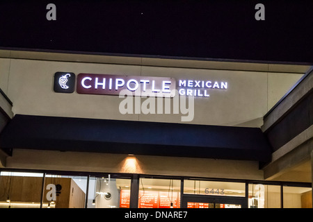 Chipotle Mexican Grill sign at night Stock Photo
