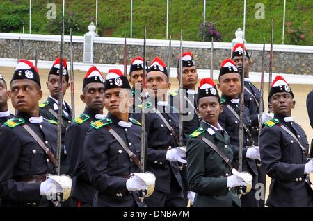 Diyatalawa, Southeast Sri Lanka. 21st Dec, 2013. Sri Lankan cadets march during a graduation parade at a military academy in Diyatalawa, Southeast Sri Lanka, Dec. 21, 2013. Credit:  Gayan Sameera/Xinhua/Alamy Live News Stock Photo