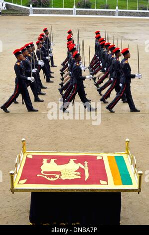 Diyatalawa, Southeast Sri Lanka. 21st Dec, 2013. Sri Lankan cadets march during a graduation parade at a military academy in Diyatalawa, Southeast Sri Lanka, Dec. 21, 2013. Credit:  Gayan Sameera/Xinhua/Alamy Live News Stock Photo