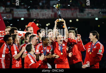 Marrakesh , Morocco. 21st Dec, 2013. Rafinha of Munich lifts the trophy after winning the FIFA Club World Cup Final between FC Bayern Munich and Raja Casablanca at Marrakesh Stadium. Credit:  Action Plus Sports/Alamy Live News Stock Photo