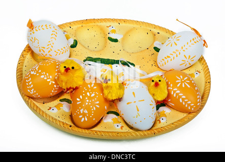 yellow chickens and colorful eggs ready for easter Stock Photo