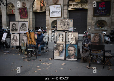 Barcelona, Spain.22nd Dec, 2013. Caricatures exposed on La Rambla in Barcelona. The city center of Barcelona is filled with walkers and visitors during the first weekend of the Christmas holidays. Credit:   Jordi Boixareu/Alamy Live News Stock Photo