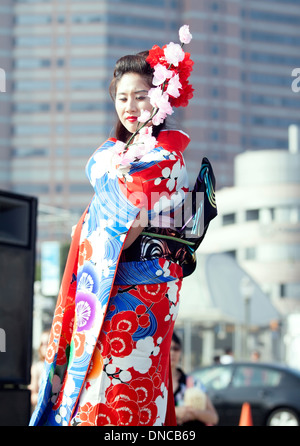 Young woman modeling a kimono during the Cherry Blossoms Festival in Little Tokyo Los Angeles Stock Photo