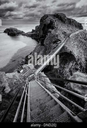 Vertigo inducing view down on  Carrick-a-Rede rope bridge. Stock Photo