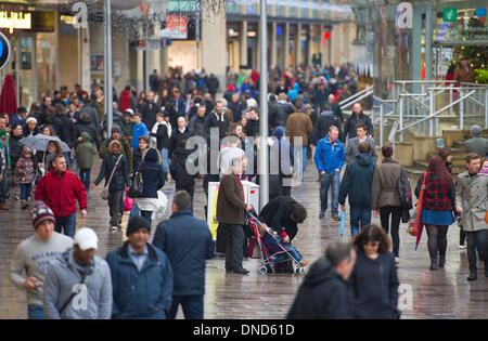 Cardiff, Wales, UK. December 23. Christmas shoppers brave bad weather on Mega Monday to go shopping for last minute presents on December 23 in Cardiff, Wales. Shoppers are expected to spend £12 billion in four days. Credit: Matthew Horwood/Alamy Live News Stock Photo