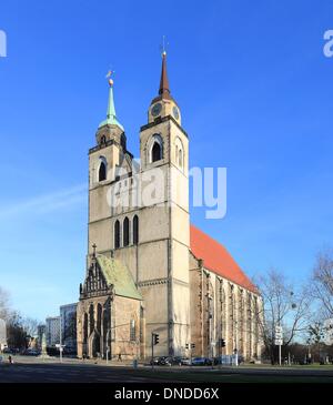 Magdeburg, Germany. 14th Dec, 2013. The St. John's Church with its two towers is pictured in Magdeburg, Germany, 14 December 2013. The church from the 12th century was destroyed in World War II. In the GDR its ruin was a monument against war and fascism. Today the church is a center for culture and events. Photo: Jens Wolf/dpa/Alamy Live News Stock Photo