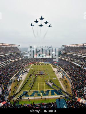 The US Navy Blue Angels flyover Lincoln Financial Field prior to the 114th Army-Navy game kickoff December 14, 2013 in Philadelphia, PA. Stock Photo