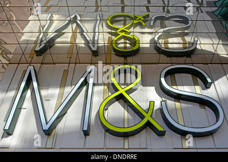 M&S store sign logo reflection in mirror tiles above Marks and Spencer shop at Westfield Stratford shopping centre Newham East London England UK Stock Photo