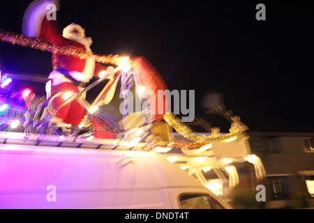 Wales, UK 22 December 2013  Father Christmas visiting the village of Deiniolen, North Wales Credit:  Gari Wyn Williams/Alamy Live News Stock Photo