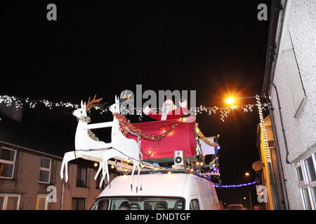 Wales, UK 22 December 2013  Father Christmas visiting the village of Deiniolen, North Wales Credit:  Gari Wyn Williams/Alamy Live News Stock Photo