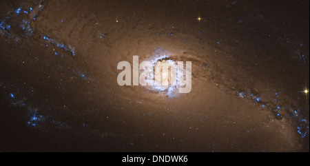 NGC 1097, a barred spiral galaxy in the constellation Fornax. Stock Photo