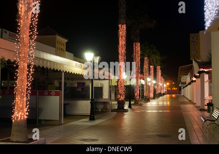 Shopping street with Christmas lights, Caleta de Fuste, Fuerteventura, Canary Islands, Spain. Stock Photo