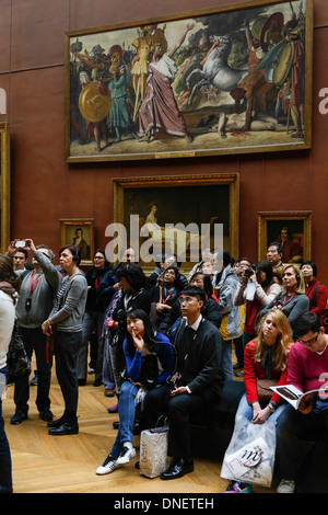Tourists in the Grand Gallery, Louvre Museum, Paris France Stock Photo