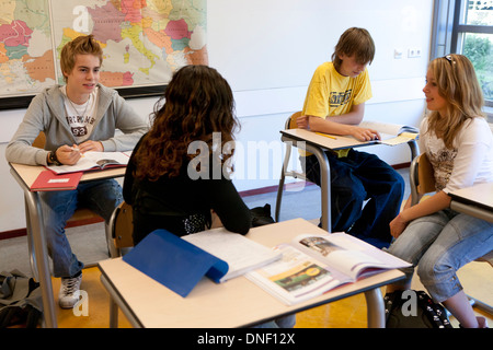 Students talking in the classroom Stock Photo