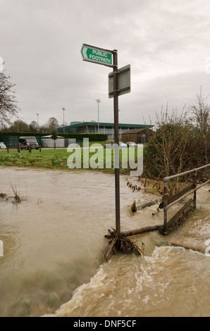 Flooded playing fields footpath in flood plane at Tonbridge School as river Medway floods floodplain Stock Photo