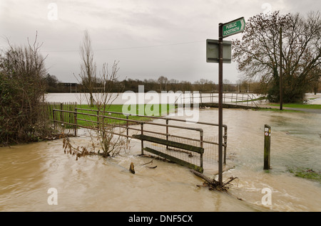 Flooded playing fields footpath in flood plane at Tonbridge School as river Medway floods floodplain Stock Photo