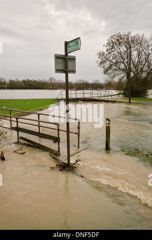 Flooded playing fields footpath in flood plane at Tonbridge School as river Medway floods floodplain Stock Photo