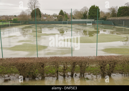 Flooded playing fields footpath in flood plane at Tonbridge School as river Medway floods floodplain Stock Photo