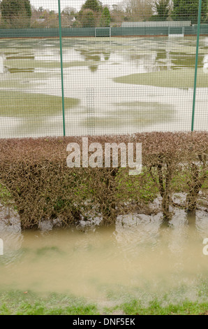 Flooded playing fields footpath in flood plane at Tonbridge School as river Medway floods floodplain Stock Photo