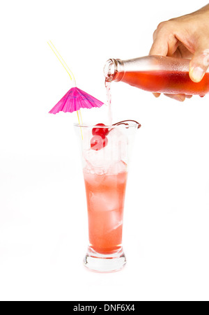 Red lemonade with party straw in hand on white Stock Photo