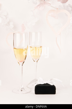 Champagne glasses and rings in present box Stock Photo