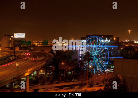 Streaking car lights at night on Interstate 45 in downtown Houston Stock Photo