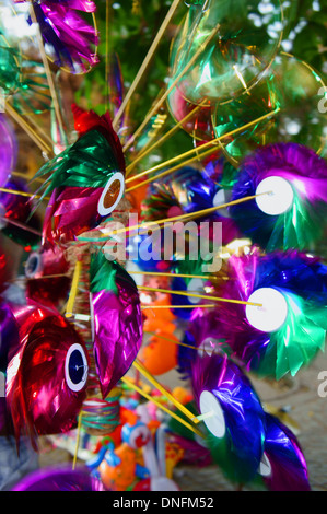 Pinwheels for sale at a market stall Stock Photo