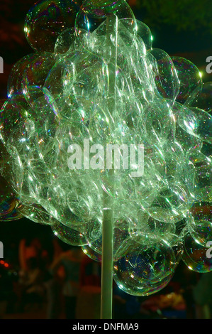 Bubble wand with bubbles Stock Photo