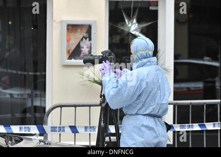 Shaftesbury Avenue, London, UK. 26th Dec, 2013. Scene of crime officers outside the Avalon club in Shaftesbury Avenue, London, where a man was shot. The man later died in hospital. Credit:  Matthew Chattle/Alamy Live News. Stock Photo