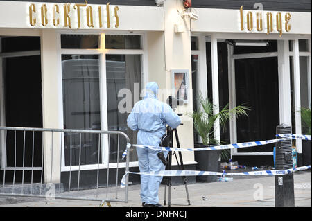 Shaftesbury Avenue, London, UK. 26th Dec, 2013. Scene of crime officers outside the Avalon club in Shaftesbury Avenue, London, where a man was shot. The man later died in hospital. Credit:  Matthew Chattle/Alamy Live News. Stock Photo