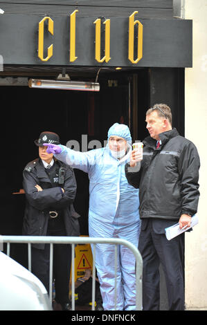 Shaftesbury Avenue, London, UK. 26th Dec, 2013. Scene of crime officers outside the Avalon club in Shaftesbury Avenue, London, where a man was shot. The man later died in hospital. Credit:  Matthew Chattle/Alamy Live News. Stock Photo