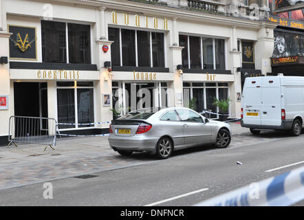 Shaftesbury Avenue, London, UK. 26th Dec, 2013. Scene of crime officers outside the Avalon club in Shaftesbury Avenue, London, where a man was shot. The man later died in hospital. Credit:  Matthew Chattle/Alamy Live News. Stock Photo